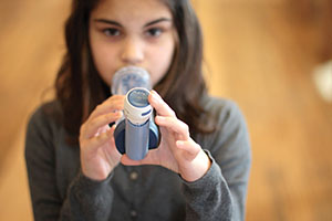 Child uses enhanced inhaler