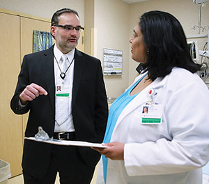 Doctor speaks with medical director