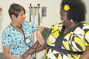 A patient gets a blood pressure check