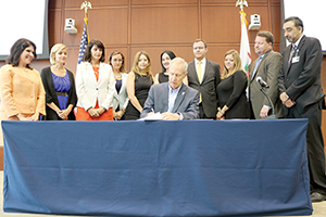 Illinois health care officials at signing ceremony