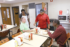 Residents and volunteers of a sober living residence