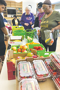 Residents at an onsite food pantry