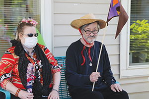 Two elderly people at a parade