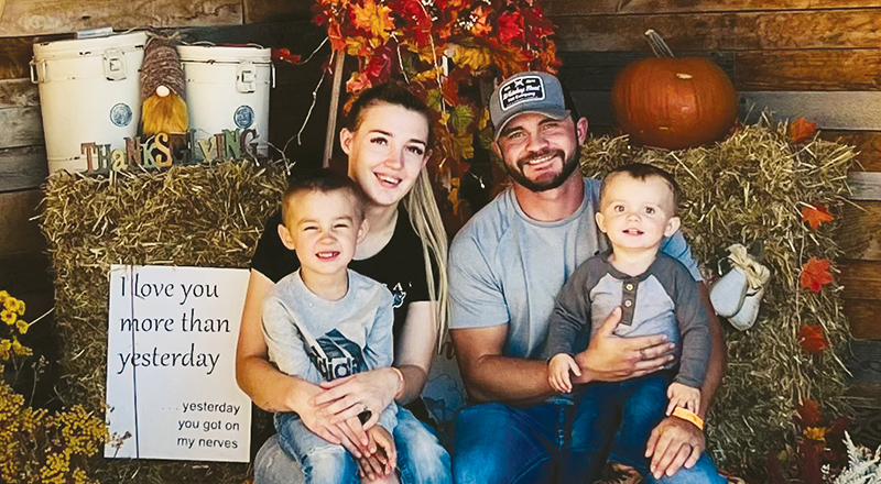 Lacey Starcevich, her husband and their sons