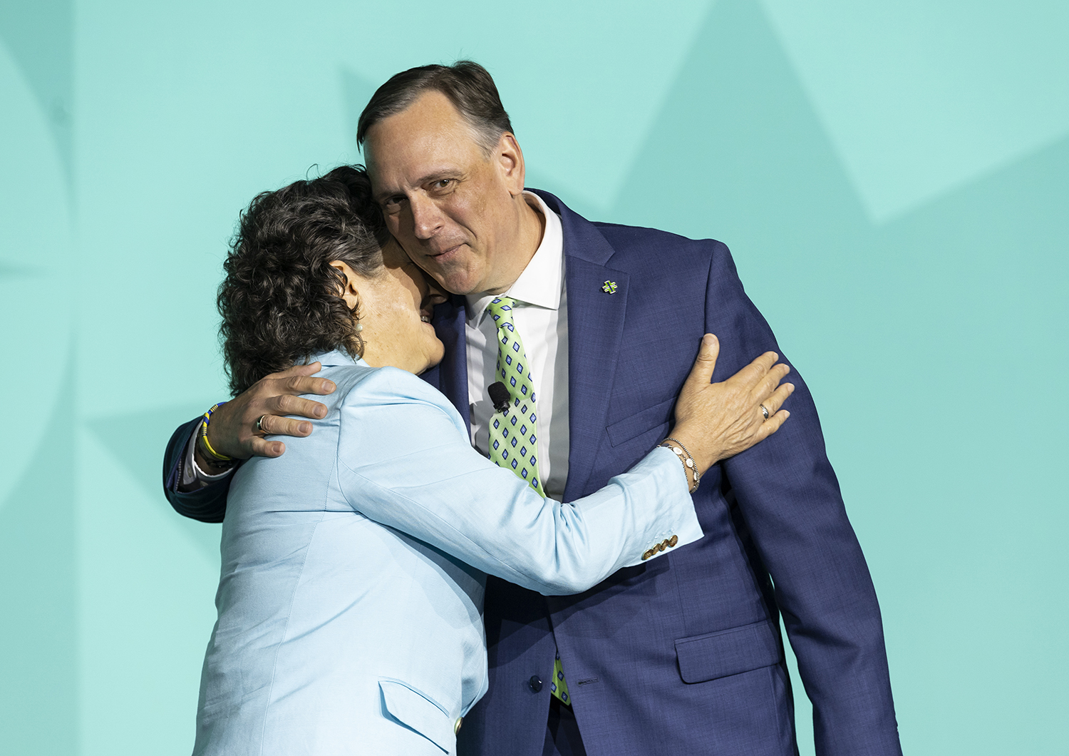 Sr. Mary Haddad hugs Orest Holubec.