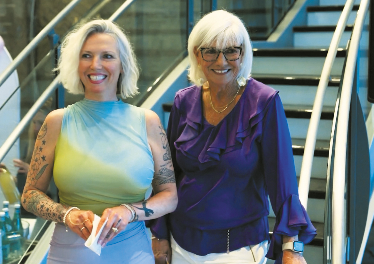 Jennifer Crawford, left, and her mother, Elisa Lawson, who co-own the store, celebrate at its reopening.