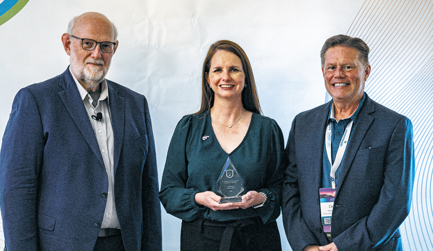 Dept_Mission_GonzalesAndSchumm_Fall_2026_photo Dr. Marisa Emmons, center, represents CHRISTUS Trinity Clinic to accept the Medicus Integra Award this past July at the Coalition for Physician & APP Well-Being’s Joy & Wholeness Summit in Memphis, Tennessee.