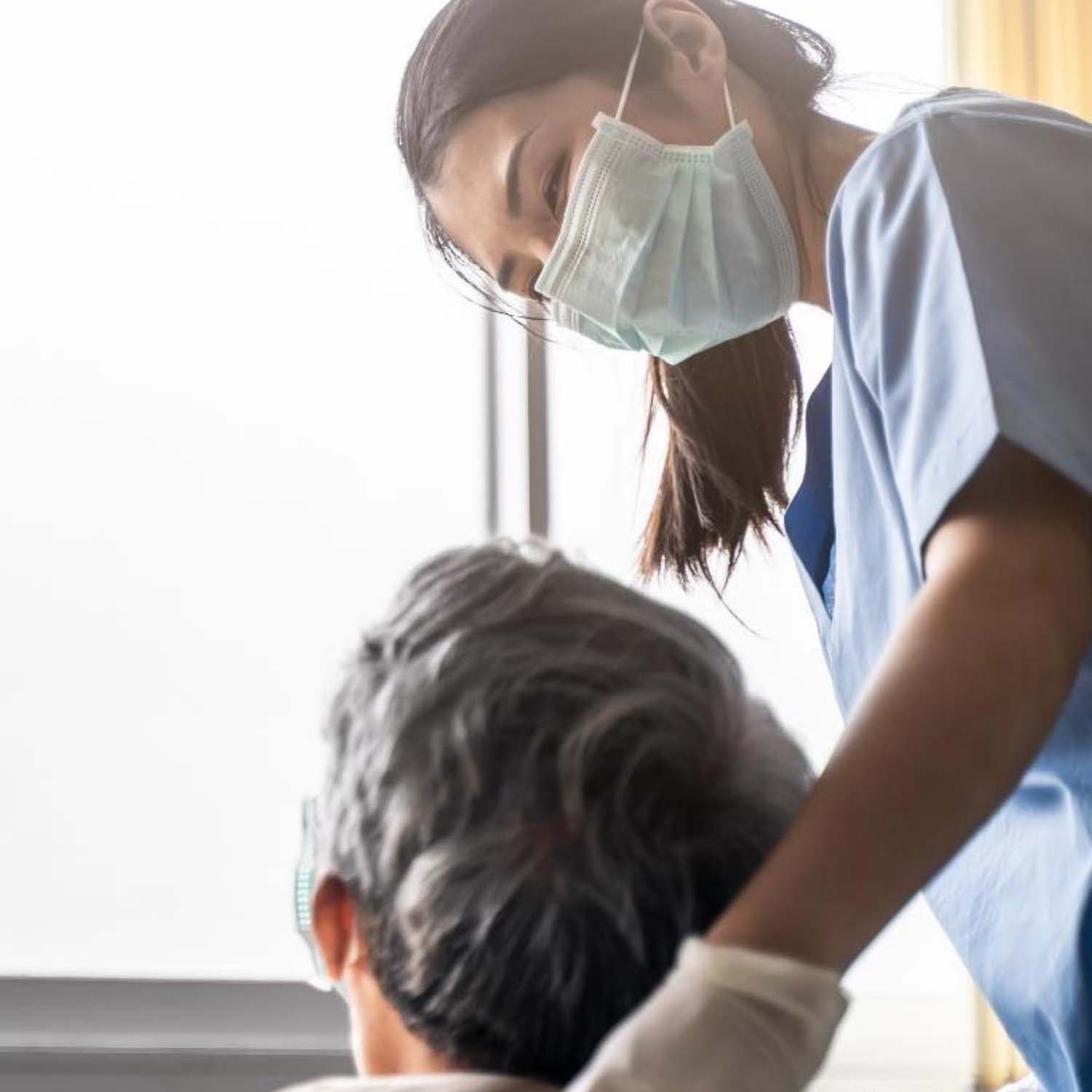 A health care provider caring for a patient